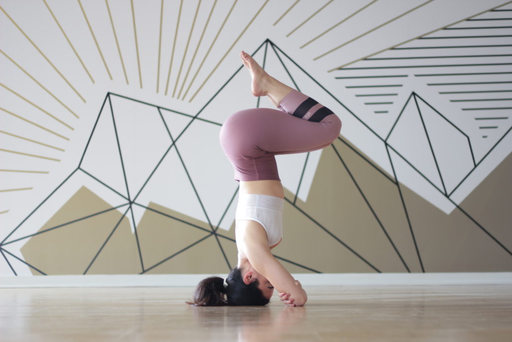 Practice These 5 Moves To Build Yourself Up To Your Headstand (Finally!)